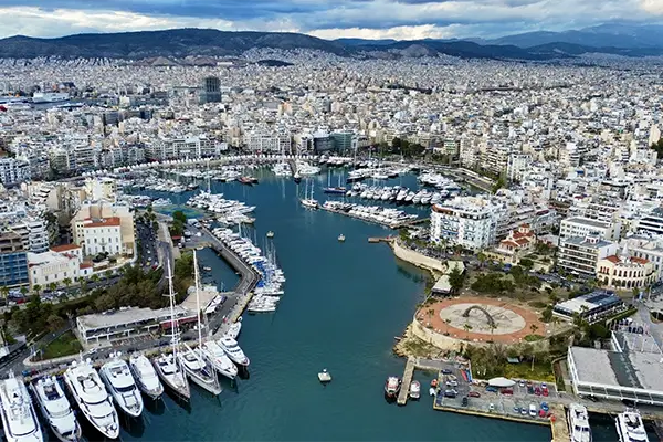 Race2Adventure Greece 2028 global vacation adventure aerial view of Piraeus harbor on a sunny day. Run, seek, adventure!
